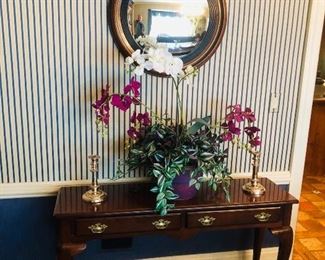 Pair of Consol tables and pair of bull’s-eye mirrors