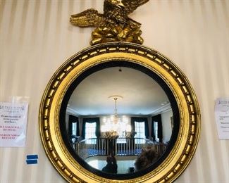 Very large gilt antique Bullseye mirror with finely carved eagle