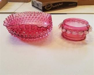 two pieces of cranberry glass - 1 is Hobnail