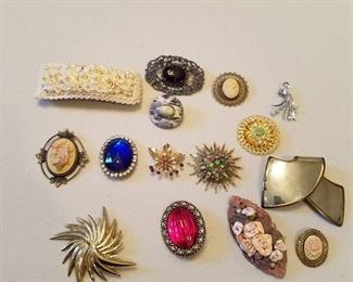 lots of assorted brooches