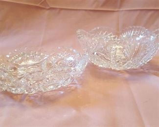 two cut crystal dishes