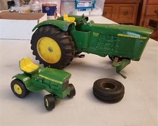 two John Deere tractors