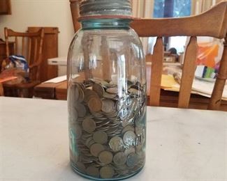 jar of wheat pennies - approximately 1400 as per measuring cup method