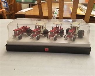 set of miniature international tractors