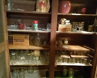 contents in cabinet - mostly jars