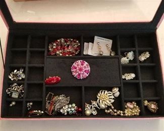 box of assorted jewelry