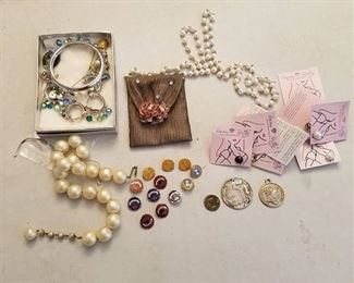 assorted jewelry and pins