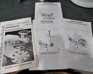 Booklets of Kitchen Aid attachments that go with Kitchen Aid Mixer