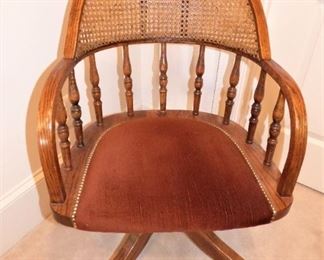 Antique Cane back rolling office chair