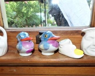 "Man in the Moon" miniature pitchers, German Duck Shakers