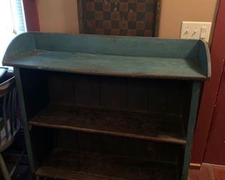 Well, this is one of the nicest early bucket benches we've had in a sale.  The paint is dry and original.  It would be great for displaying your most treasured primitives or makes a special statement empty. 