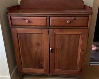 This antique sideboard is one of the most usable pieces of furniture I know of.  In a dining room it lends itself for linen and china storage; bedroom for clothing; in larger bathrooms linen; hallway for hats, shoes, etc. 