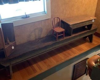 An exceptional 7 ft. long bench with splay legs and great original surface and a green-blue paint.  