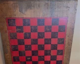 A "makedo" checkerboard on a early bread board.