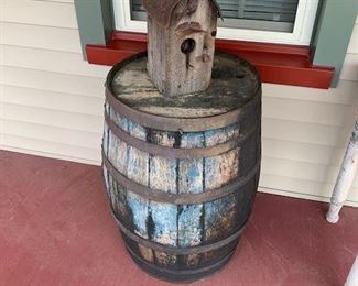 Early wooden barrel traces of blue paint and early bird house.