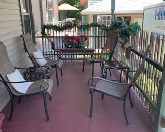 Group of porch furniture and decorations.