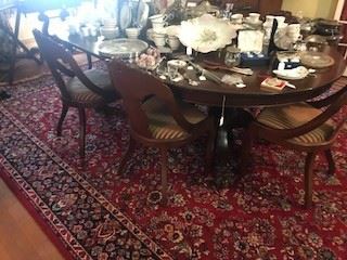 Banquet table - Mahogany with three leaves - seats about 12 - maybe more if everyone's on a diet - circa 1840 - great condition - wool rug - big, really big...