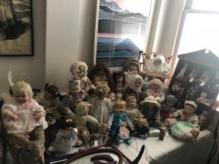 There are about 4,000 dolls - here are a few ... (OK, that may be a slight exaggeration) - most all have porcelain heads