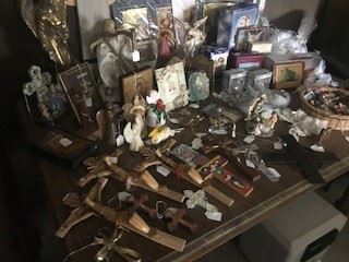 Lots of religious artifacts - crosses and angels primarily...