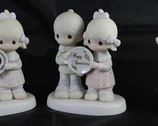 Precious Moments: E-2860 50th Anniversary, E-2853 Happy Anniversary and E-5637 “Heavenly Light” Figurines 