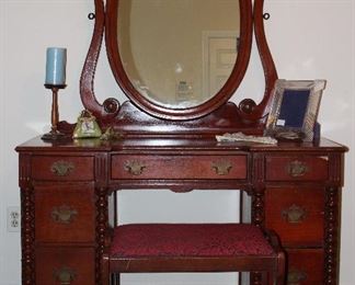 Antique Cherry Vanity with Oavl Tilting Adhuatable Mirror and Vanity Stool (48”W x 18”D x 29” to top of Vanity). Matching Spool Turned Full/Double Bed Frame including Headboard, Footboard and Side Rails