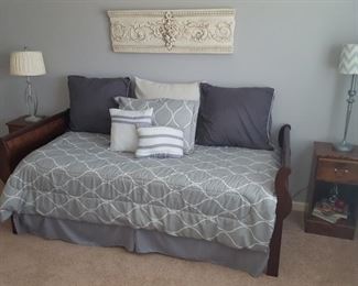 Twin size bed sleigh bed. Comforter Bedding Set with Euro Pillow covers, dust ruffle and accent pillows  sold separately.