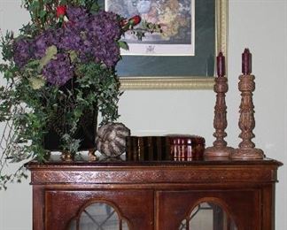 Cherry Small Lighted Credenza With 2 Glass Shelves (39”W x 30”H x 15”D). Also Shown: Large Hydrangeas Arrangement with Red Silk Roses w/ Foote Black Metal Tin w/ Gold Accents