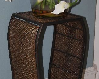 Metal Frame Rattan/Wicker Woven Plant Stand (24.5”H x 10.5 “W x 10.5”D ) Shown with Silk Calla Lily Floral Arrangement