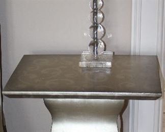 Champagne Rectangular Pedestal End Table (26.5”H x 22”W x 17”D) Shown with Herminie Stacked Ball Acrylic Table Lamp (1 of 2 shown)
