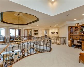 Upstairs Landing with Build-in Cabinet/Desk showing various items