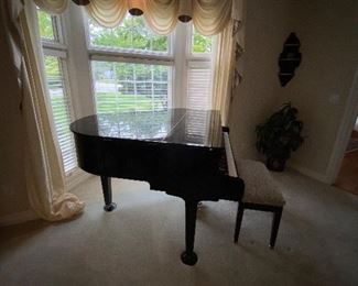 $3,000 D. H. BALDWIN BLACK LACQUER BABY GRAND PIANO
COMES WITH STOOL
57”W x 55”L x 39.5H 