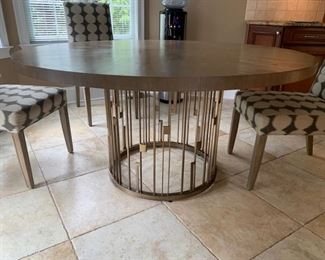 29. Round Dining Table on Metal Contemporary Base (60'' x 31'')