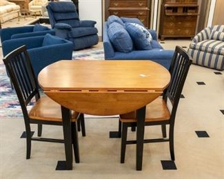 Adorable fold out table and two chairs.