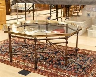 Glass top coffee table and rug