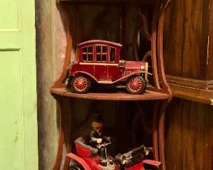 Date stamp with ink pad, wind-up toys, cute corner shelf