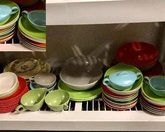 Shelf full of plastic dishes, look at those colors!