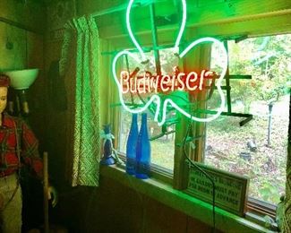 Really cool Budweiser neon sign, also boy mannequin!