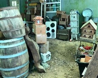 Under porch items: vintage crates, barrels, birdhouses...