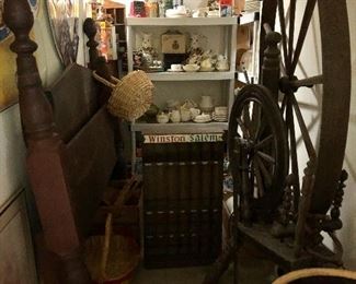 Two spinning wheels, large crock, Winston/Salem cigarette display, large crock