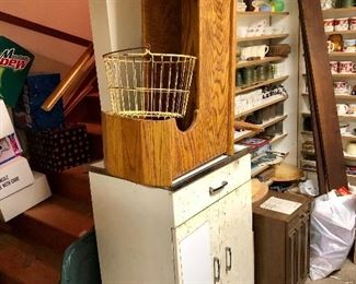 Metal cabinet , oak rocking cradle, more loaded shelves! 