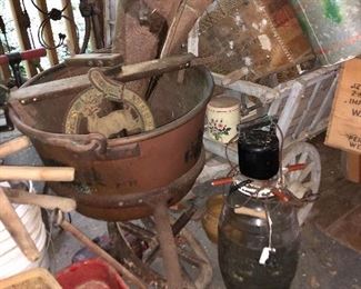 Look at the large copper pot with stand( can you say fudge?) mayonnaise jar with mixer, radio flyer wagon one of two, minnow bucket