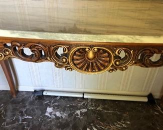 #7) $150 - Carved wood, gold painted marble top parlor table.  51"W x 21" D x 30" H.