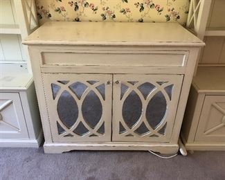 #5) $400 - Four piece painted wooden shelving entertainment cabinet set.  There are two of the tall book shelves with double cabinets on the bottom, there is one center console for a TV with double cabinets underneath.  There is one free standing book shelf.  Tall shelves are 46 inches wide by 19 inches deep by 81 inches tall.  The entertainment cabinet is 42 inches wide by 22 inches deep by 36 inches tall.  The separate shelf is 42 inches wide by 22 inches deep by 46 tall.  