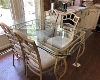 #22) $225 - Glass top Iron dining table with 4 iron/upholstered chairs. Table is 48 x 36.  