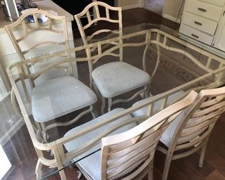 #22) $225 - Glass top Iron dining table with 4 iron/upholstered chairs. Table is 48 x 36.  