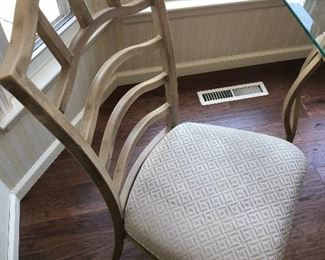 #22) $225 - Glass top Iron dining table with 4 iron/upholstered chairs. Table is 48 x 36.  