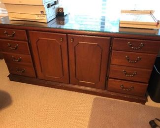 #25)  $200 - Matching Solid cherry Cradenza with Glass Top.  8 drawers and double cabinet.