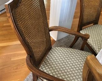 #28)  $600 Stanley brand pecan dining table with 8 chairs. (2 captain chairs and 6 side chairs).  Chairs are wicker back with upholstered seats.  In Excellent condition.  Well cared for furniture.  Matching Stanley pecan 2 piece hutch sold separately.  