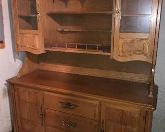 #29)  $500 Stanley brand pecan two-piece hutch.  In Excellent condition.  Well cared for furniture.  Matching Stanley pecan dining table with 8 chairs. (2 captain chairs and 6 side chairs).  sold separately.  