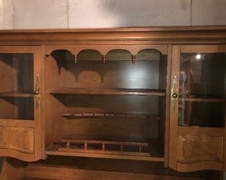 #29)  $500 Stanley brand pecan two-piece hutch.  In Excellent condition.  Well cared for furniture.  Matching Stanley pecan dining table with 8 chairs. (2 captain chairs and 6 side chairs).  sold separately.  